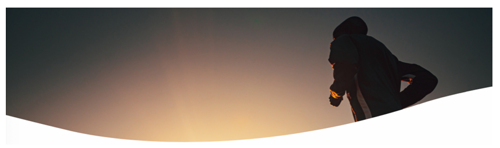 A group of enthusiastic runners at the UltraMARAthon starting line, ready for a thrilling adventure.